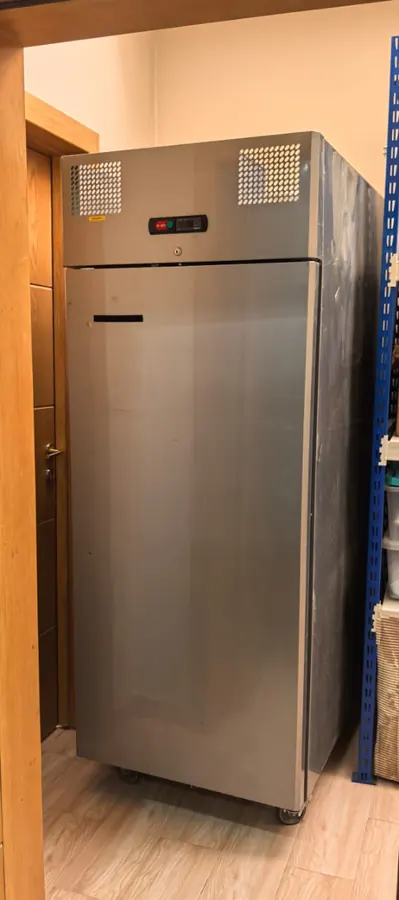 Commercial stainless-steel upright refrigerator — repair by Noura, Riyadh