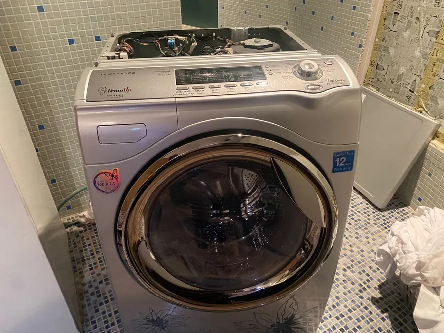 Daewoo DrumUp 13/7 kg washer-dryer opened for repair — repair by Noura, Riyadh