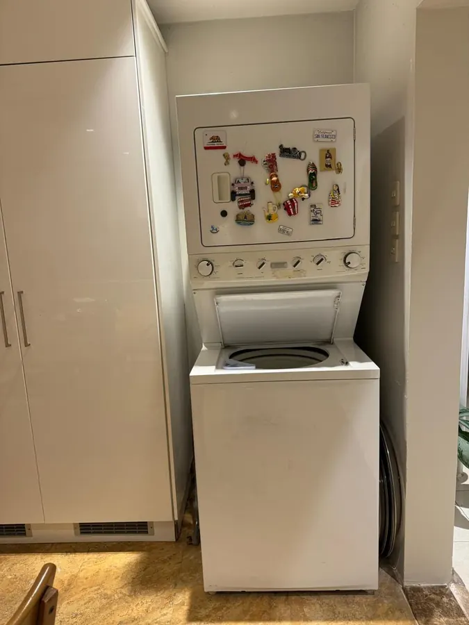 Stacked washer & dryer unit — repair by Noura, Riyadh